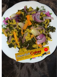 A picture of Dambun couscous with moring leaves and carrot.