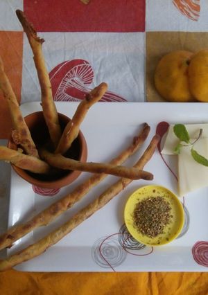 A picture of Orange and cheese straws.