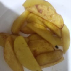 A picture of Potato wedges.