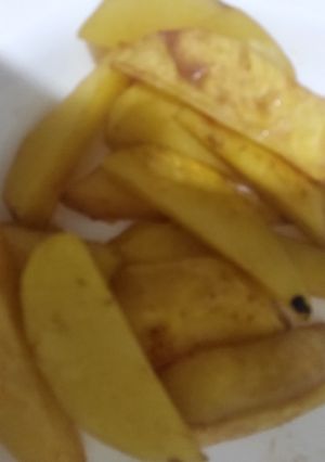 A picture of Potato wedges.