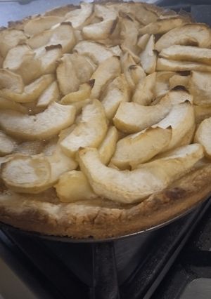A picture of Apple tart with caramel and ground almonds.