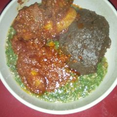 A picture of Ewedu and amala with buka stew.