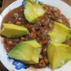 A picture of Stewed githeri with Avocado.