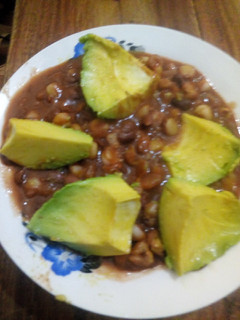 A picture of Stewed githeri with Avocado.