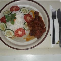 A picture of Tropical Rice with chicken.