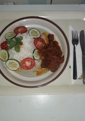 A picture of Tropical Rice with chicken.