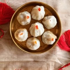 A picture of Modak/ Kozhukattai with Coconut and Jaggery.