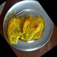 A picture of Pumpkin flower fritters.