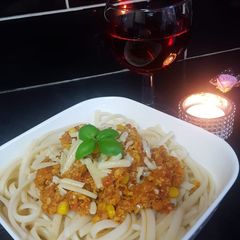 A picture of Chicken spaghetti with Sweet corn.