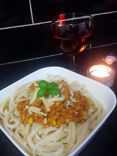 A picture of Chicken spaghetti with Sweet corn.
