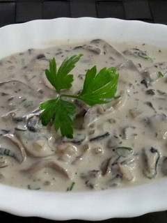 Una foto de Champiñones con nata