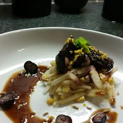 A picture of Blueberry glazed pigeon breast.