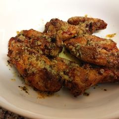 A picture of Lemon pepper chicken wings in the air fryer.