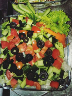 A picture of Cucumber Tomato & Olive Salad.