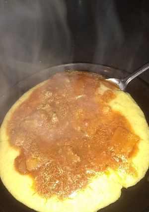 Una foto de Polenta con tuco