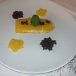 Arroz con leche con geleé de mango, caviar de chocolate y perlas de mango