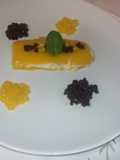 Arroz con leche con geleé de mango, caviar de chocolate y perlas de mango