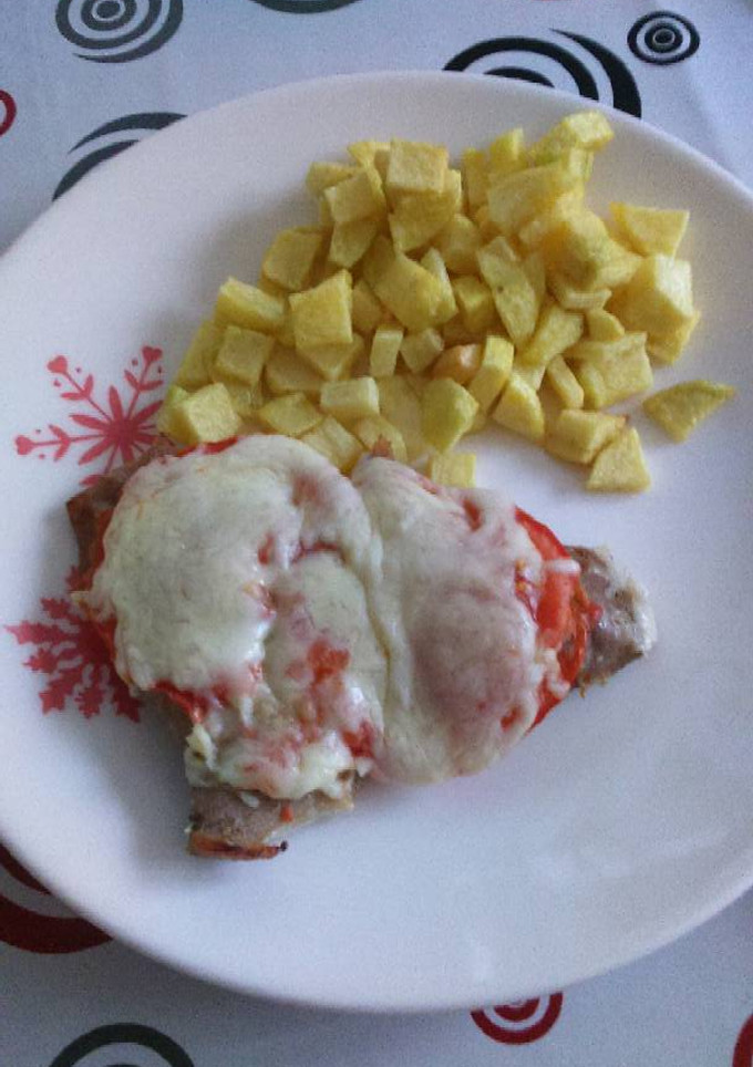 Una foto de Secreto de cerdo a la pizza