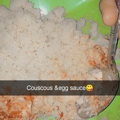 A picture of Couscous & egg sauce.