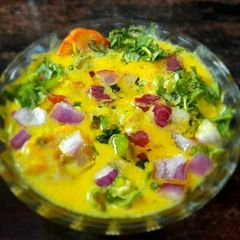 A picture of Punjabi Methi Onion Pakoda Kadi.