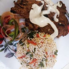A picture of Beef steak with vegetables & Egg fried Rice #luxurymeal.