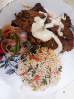 A picture of Beef steak with vegetables & Egg fried Rice #luxurymeal.