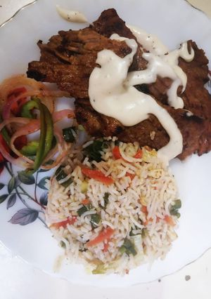 A picture of Beef steak with vegetables & Egg fried Rice #luxurymeal.
