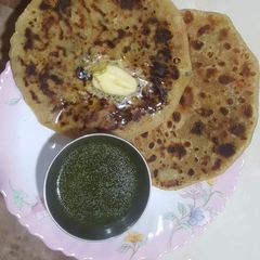 A picture of Stuffed Potato & Onion Paratha.