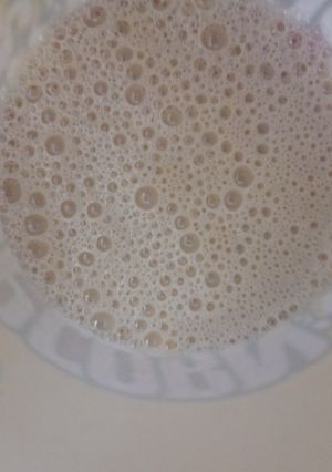 Una foto de Te de naranja con leche (y un poco de café)