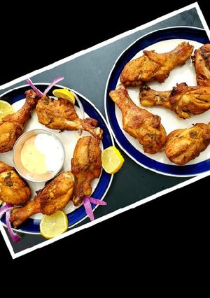 A picture of Tandoori chicken in Oven Gas stove.