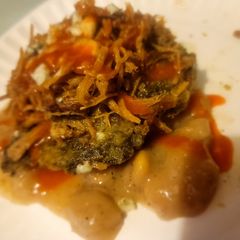 A picture of "Southern Layers" Meal-in-One (Pork, Green Cake Fritters, Beans).