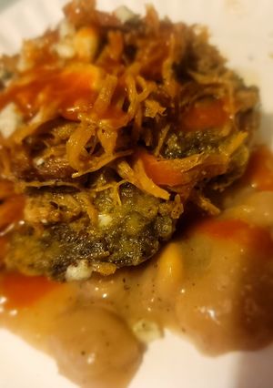 A picture of "Southern Layers" Meal-in-One (Pork, Green Cake Fritters, Beans).