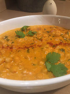 Una foto de Garbanzos aromatizados en salsa de coco 🥥