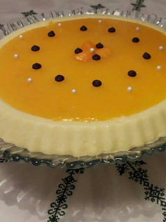 Una foto de Postre de leche y naranja