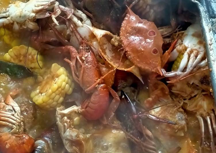 Kepiting & baby lobster masak saos ala" ibu raisha
