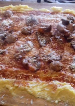 Una foto de Polenta a la tabla