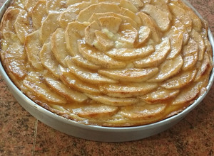 Una foto de Kuchen de manzana con crema pastelera
