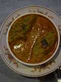 Potoler dorma (stuffed pointed gourd curry)