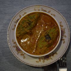 Potoler dorma (stuffed pointed gourd curry) A picture of Potoler dorma (stuffed pointed gourd curry).