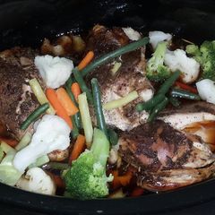 A picture of Jerk Chicken Breast in the Crockpot with Vegetables .