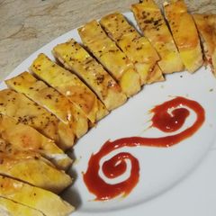 A picture of Chicken cheese bread.