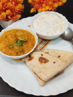 A picture of Arbi Masala Curry in curd.