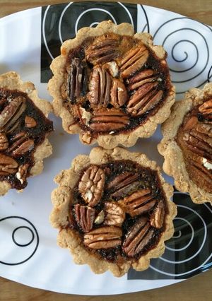 Una foto de Tartaletas de Pecan pie