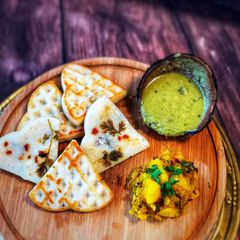 A picture of Masala  Uttapam Waffle.