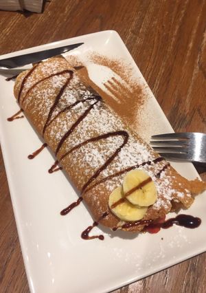 Una foto de Crepes con nocilla plátano y fresas