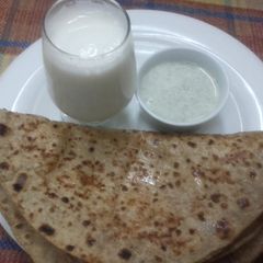 A picture of Moli ka paratha&mint cutni&namkeen lassi.