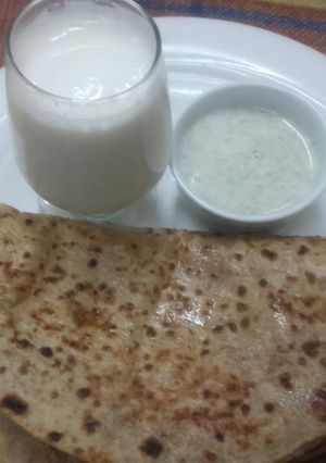 A picture of Moli ka paratha&mint cutni&namkeen lassi.