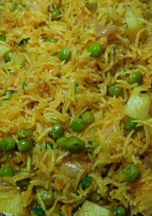 A picture of Fluffy Veggie Pulao in a Pressure Cooker.
