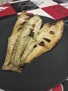Una foto de 🐟 Lubina a la donostiarra