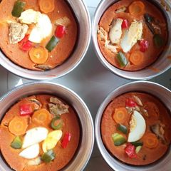 A picture of Plates Moimoi with boiled Eggs.